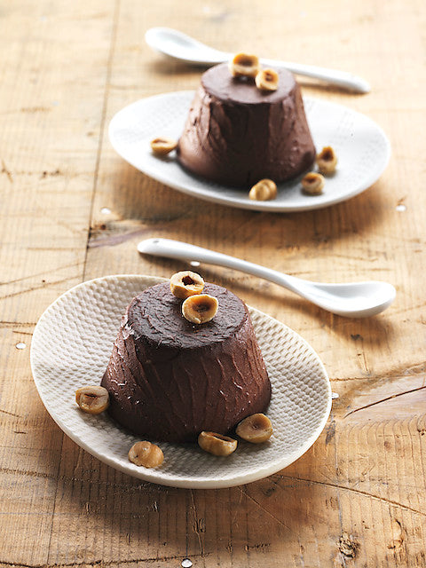 Hirsepudding mit bitterem Kakao und Haselnüssen